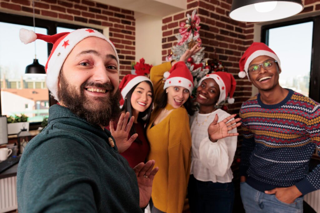 friends celebrating the holidays in Santa hats